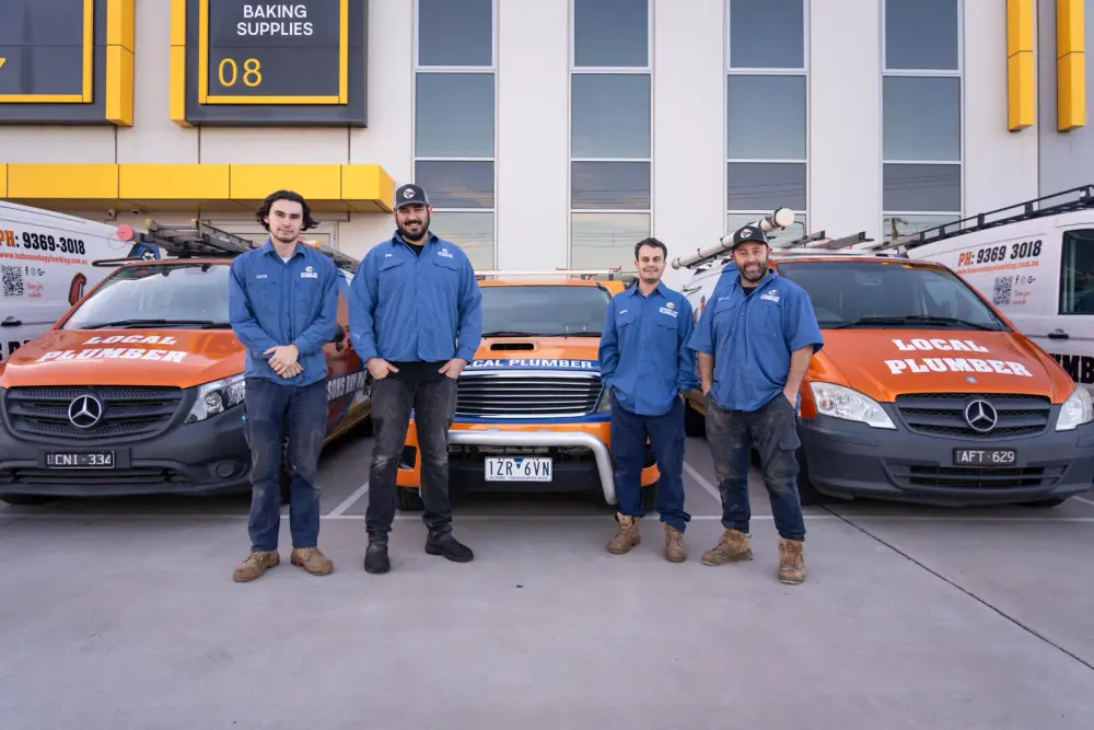 The Hobsons Bay Plumbing team with the van fleet