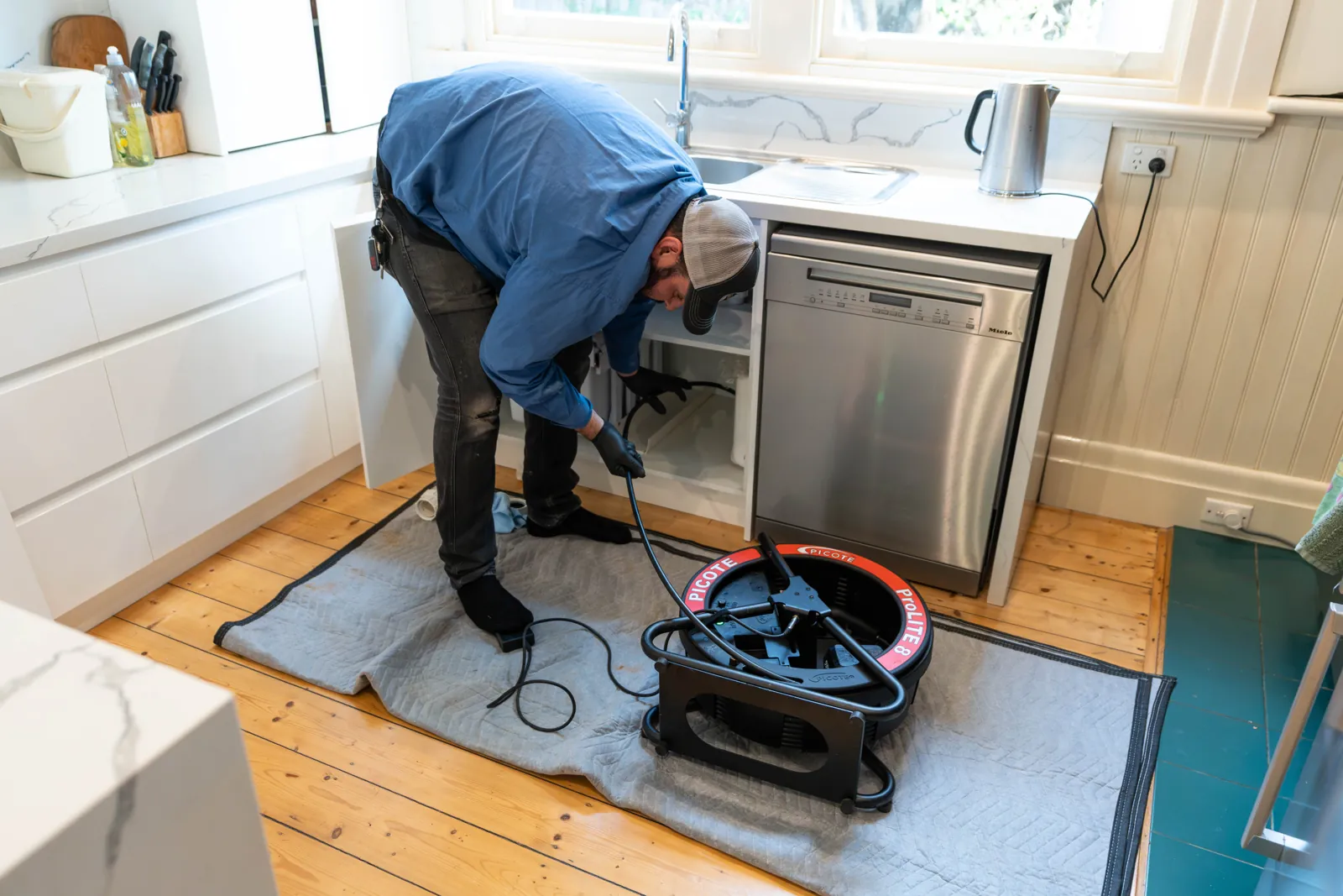Under-sink leak repair in a Flemington kitchen